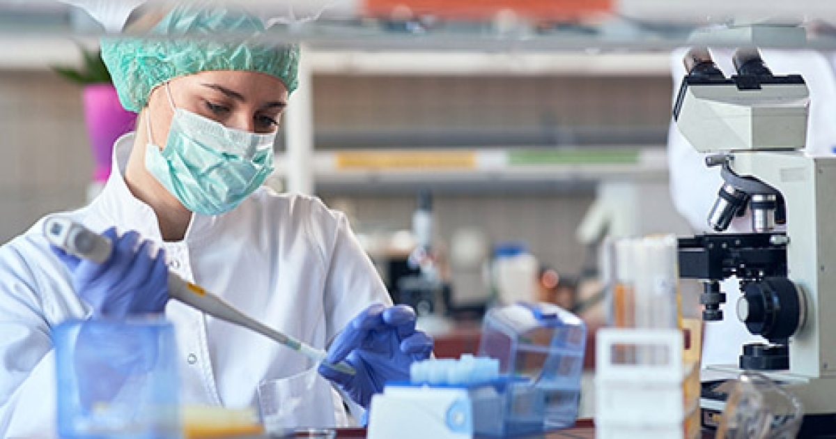 A scientist working on the research for treatment.